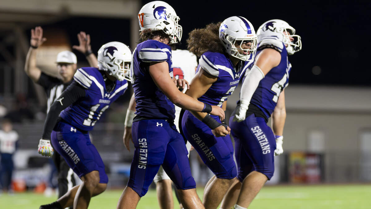 The Sumner Spartans react to a stop against the Kennedy Catholic Lancers during the second half of the game at Sunset Chev Stadium on Friday, Sept. 12, 2025, in Sumner, Wash.