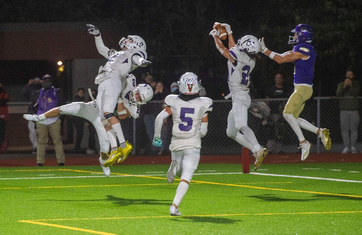 On the final play of the game Sumner defensive back Jay Mentink knocks away a fourth-down pass intended for Puyallup receiver Dane Parker in the end zone. The Spartans captured a 26-21 victory over the Vikings in a rivalry game at Sparks Stadium on Friday, Sept. 17, 2021.