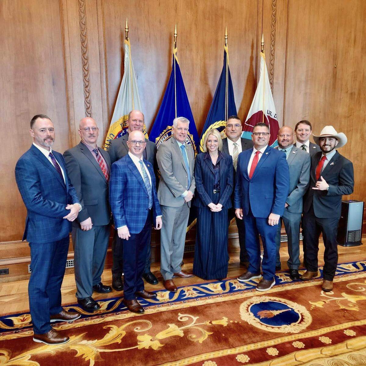 Sheriff Keith Swank (third from left, front) is shown in an undated photograph with other sheriffs from Washington state during a meeting with U.S. Attorney General Pam Bondi, in Washington, D.C.