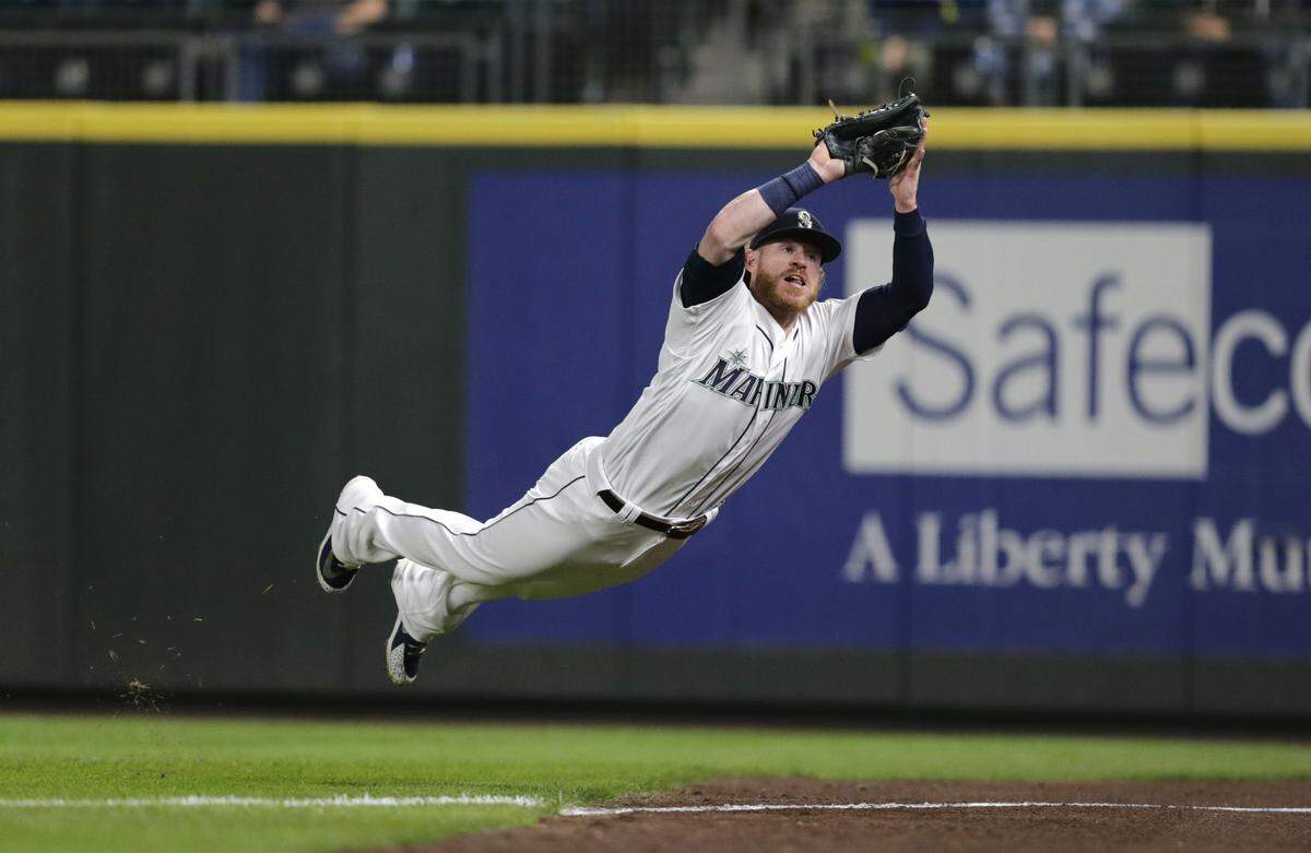 Seattle Mariners right fielder Ben Gamel leaps to make the catch on a ball hit by Baltimore Orioles’ Austin Wynns during the fifth inning of a baseball game Tuesday, Sept. 4, 2018, in Seattle. (AP Photo/John Froschauer)