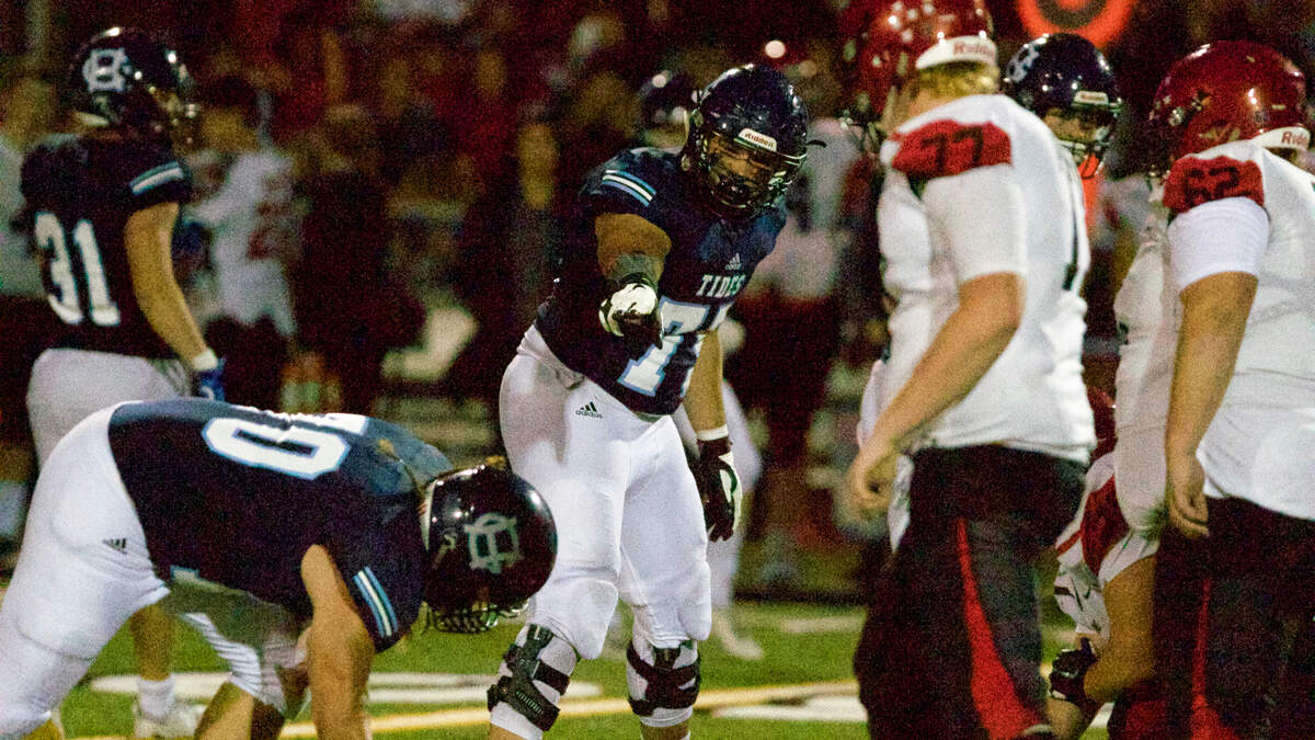 Gig Harbor center Brenden Rivera lines up the offense against Yelm on Friday night at Roy Anderson Field. Yelm won, 16-13.