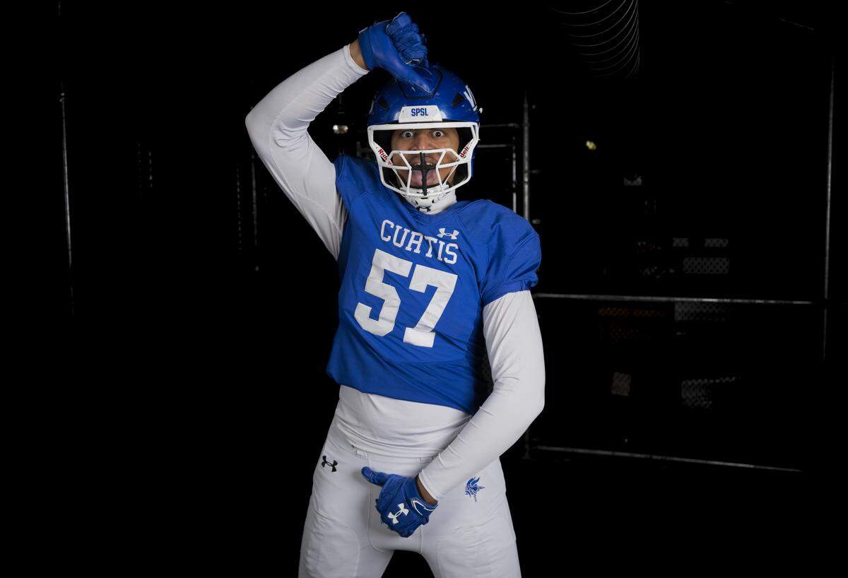 Curtis senior defensive end Robby Lavata’i poses for a portrait after being selected as first-team defense for The News Tribune’s 2025 All-Area football team at Mount Tahoma High School, on Sunday, Dec. 7, 2025, in Tacoma, Wash.
