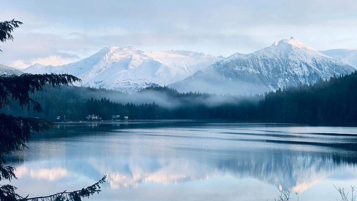 The body of Ryan Ruesch, 47, was found below a 300-foot cliff in Alaska, officials said.