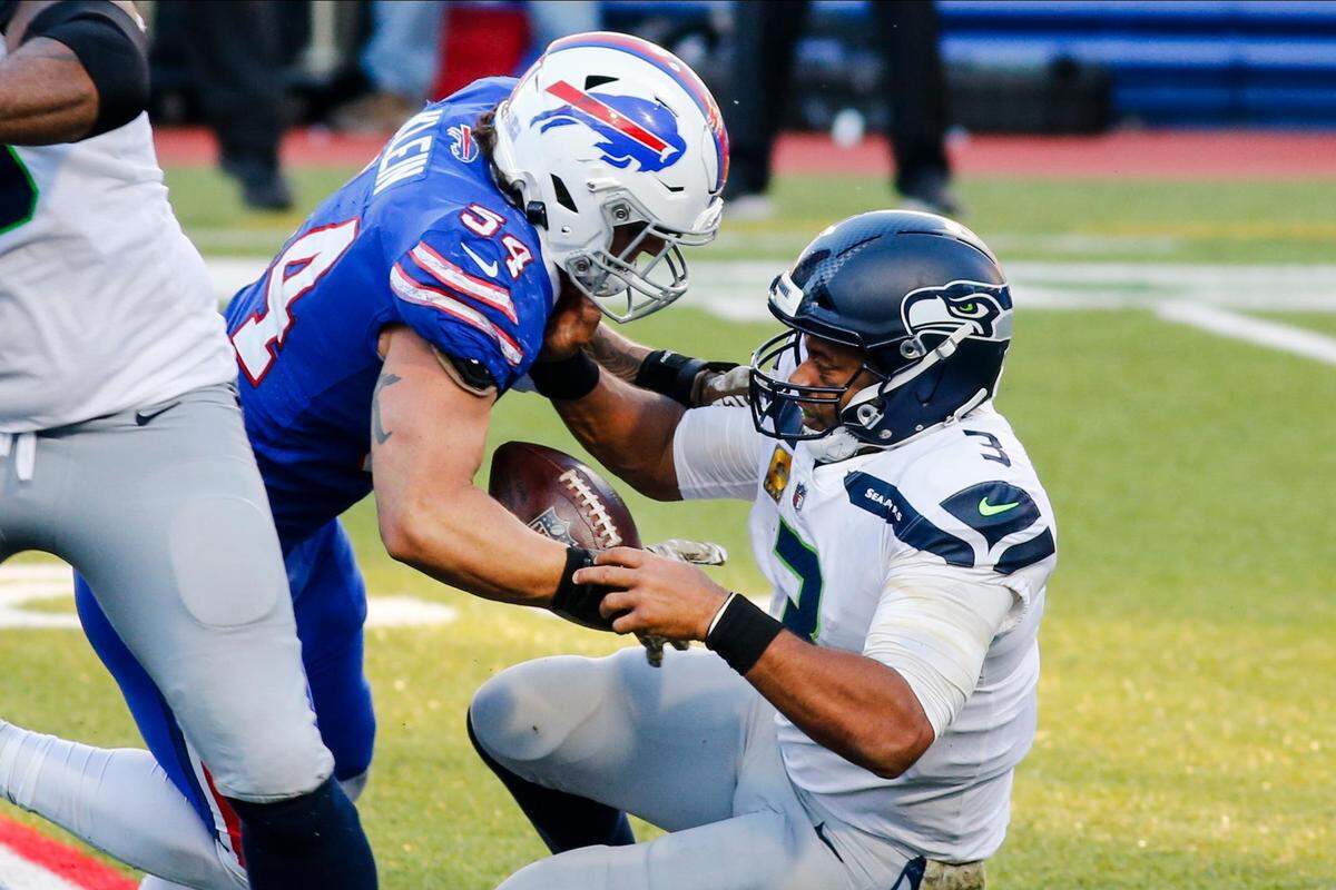 Buffalo Bills’ A.J. Klein (54) strip sacks Seattle Seahawks quarterback Russell Wilson (3) during the second half of an NFL football game Sunday, Nov. 8, 2020, in Orchard Park, N.Y. Klein recovered the ball on the play. (AP Photo/Jeffrey T. Barnes)