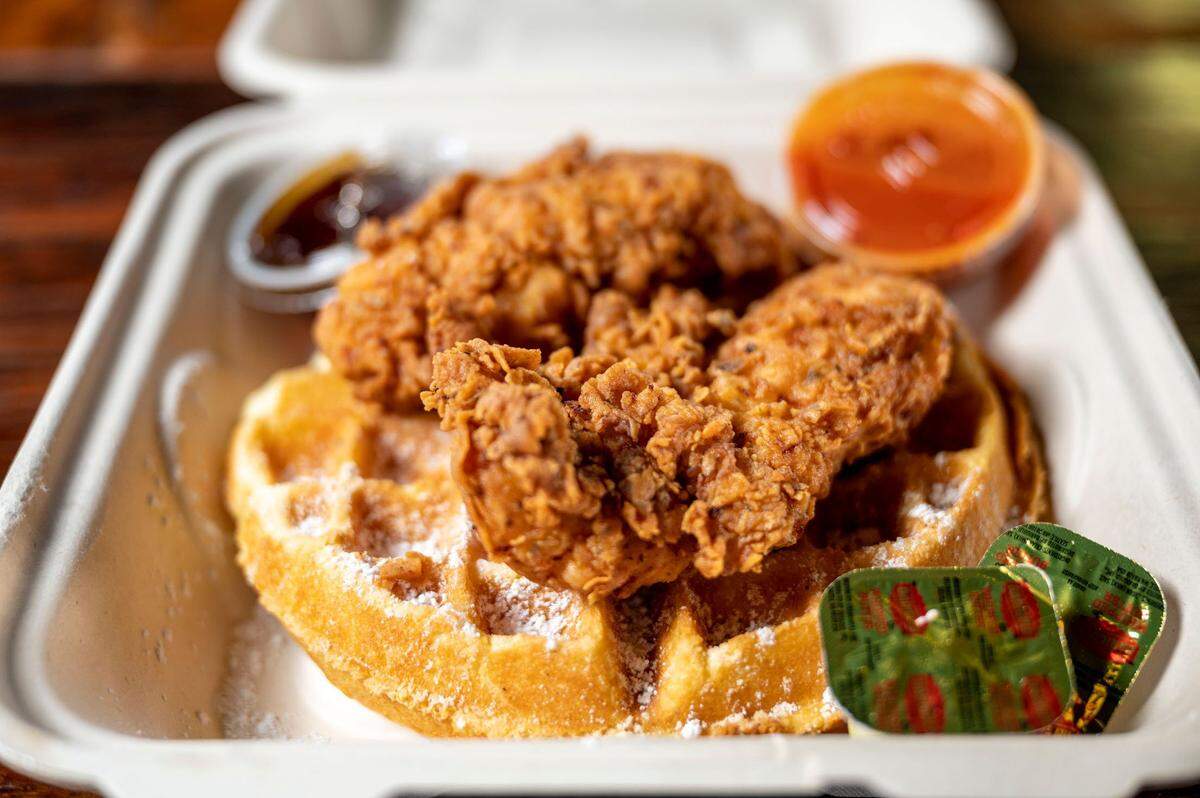 Fried chicken on a Southern corn-bread waffle at Buddy's Chicken and Waffles in Tacoma.