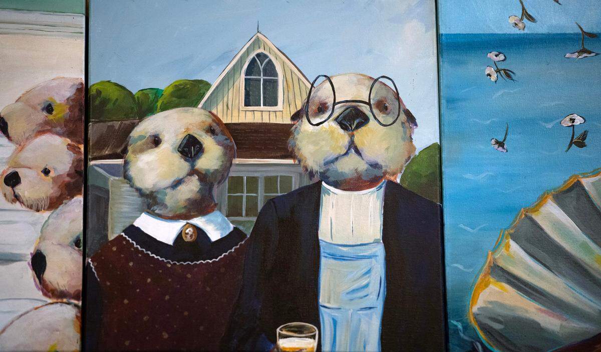 Cheeky otter-themed artwork adorns the walls of the taproom and the brewery’s swag.