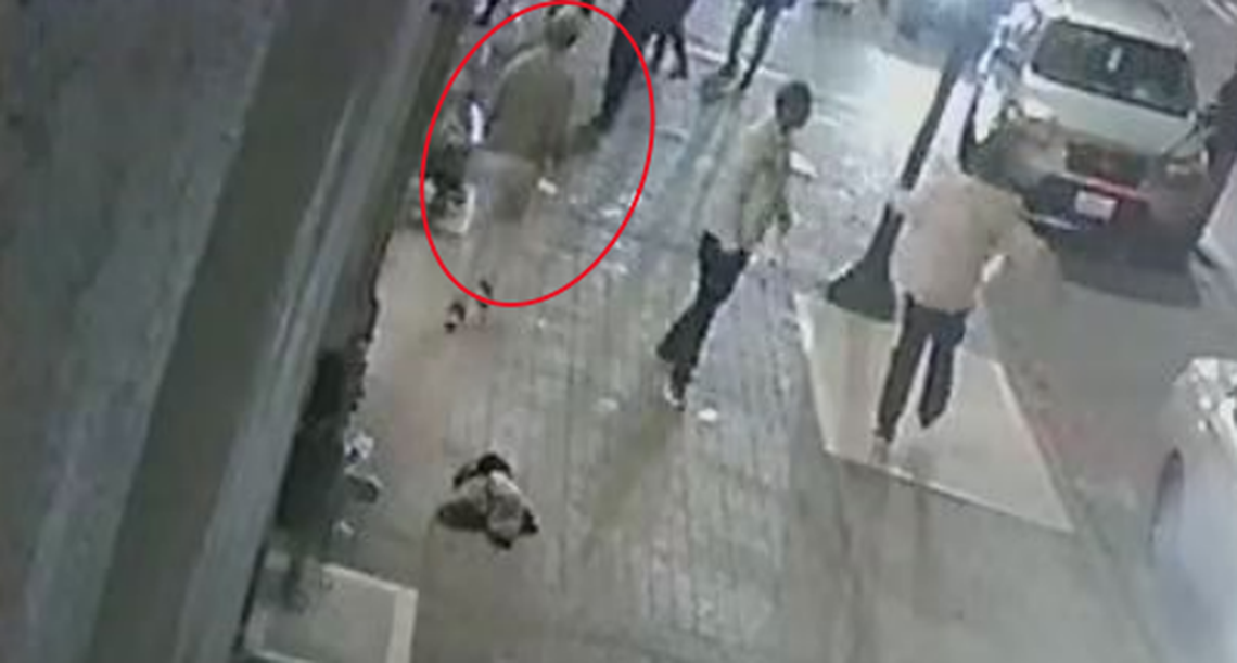 An image from surveillance video on South Tacoma Way shows the moment when Joice Duane Williams, circled, ran toward his brother and Reginald Taylor on May 8, 2022. Williams’ defense attorney said he was trying to deescalate the confrontation between the two men.