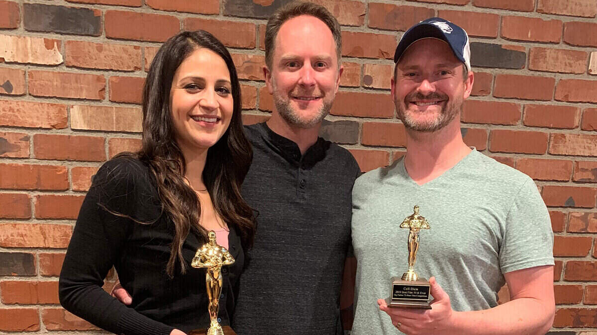 Dr. Christopher Kerr (center) and the stars of his short film, Samantha Allen and Brad Bennett, stop for a photo after “Cafe Diem” won best overall at the 2019 72-hour film competition, which is part of the Gig Harbor Film Festival.