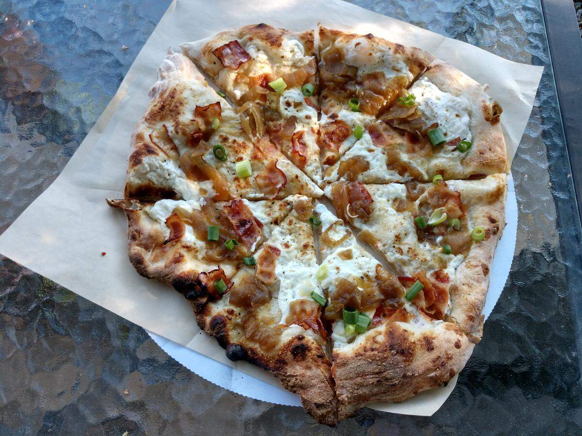 Flammkuchen, a German-style pizza, from Sirius Wood Fired Pizza.