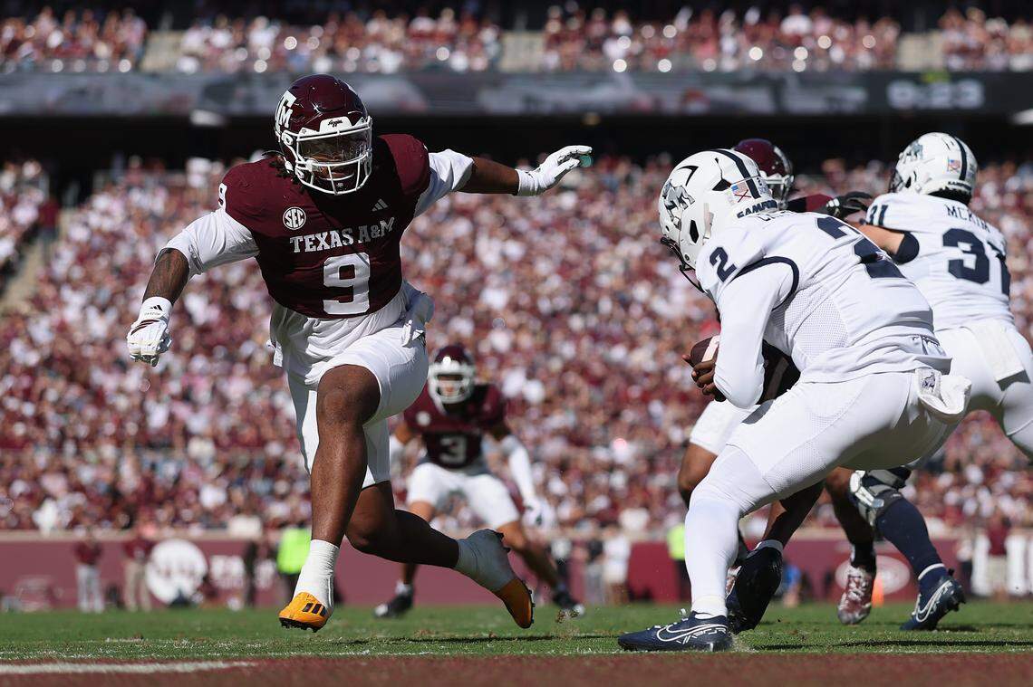 COLLEGE STATION, TEXAS - NOVEMBER 22: Cashius Howell #9 of the Texas A&M Aggies defends Quincy Crittendon #2 of the Samford Bulldogs in the first quarter at Kyle Field on November 22, 2025 in College Station, Texas. (Photo by Tim Warner/Getty Images)