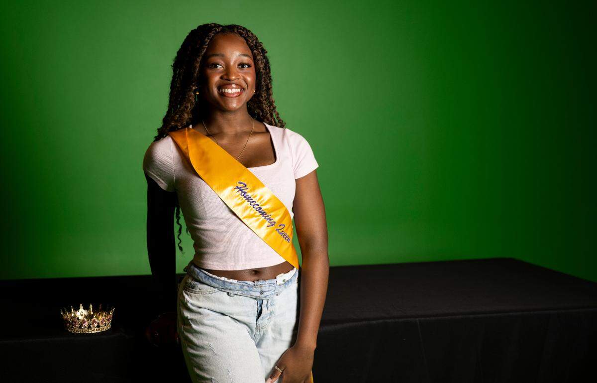 Patience Brown, the school’s first elected Black homecoming queen, poses for a portrait inside the media room at Puyallup High School, on Wednesday, Feb. 26, 2025, in Puyallup.