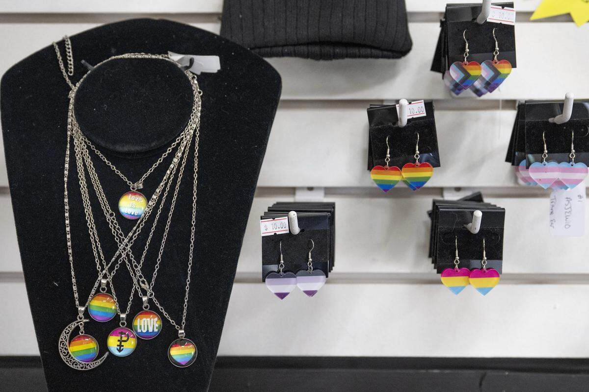 A collection of Pride jewelry hangs on display at A Gift of Serenity, a gift store at Freighthouse Square, on Wednesday, Jan. 21, 2026, in Tacoma, Wash.