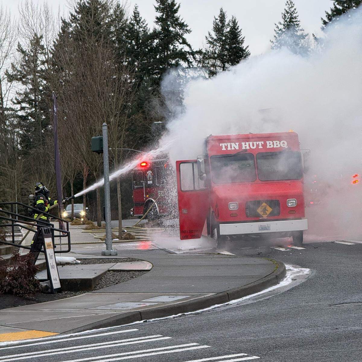 Crews from Central Pierce Fire and Rescue work to put out a fire at Tin Hut BBQ on Feb. 23, 2026.