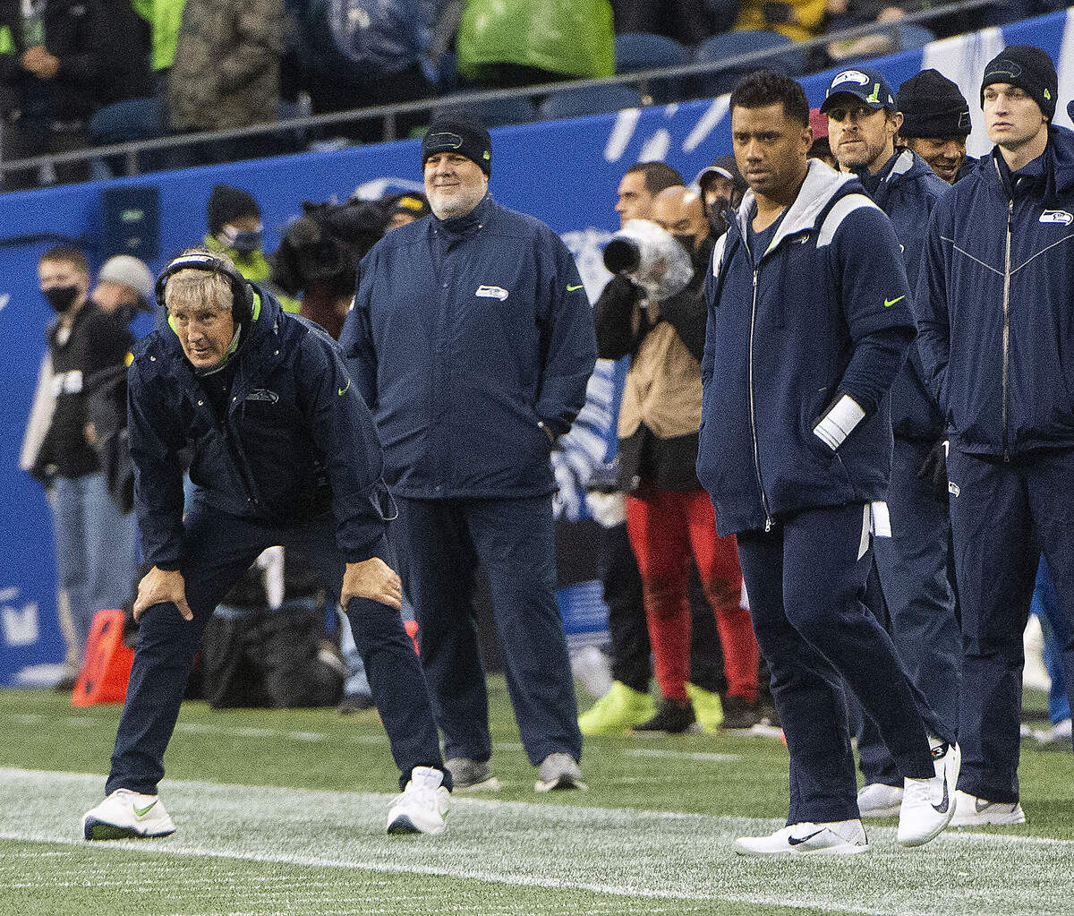 Seattle coach Pete Carroll and QB Russell Wilson watch the Seahawks’ offense struggle during an NFL game between the Seattle Seahawks and the New Orleans Saints at Lumen Field in Seattle on Monday, Oct. 25, 2021.