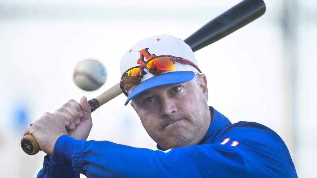 Auburn Mountainview head coach Glen Walker hits infield before a baseball game at Auburn Mountainview High School in Auburn on Wednesday, April 24, 2019.