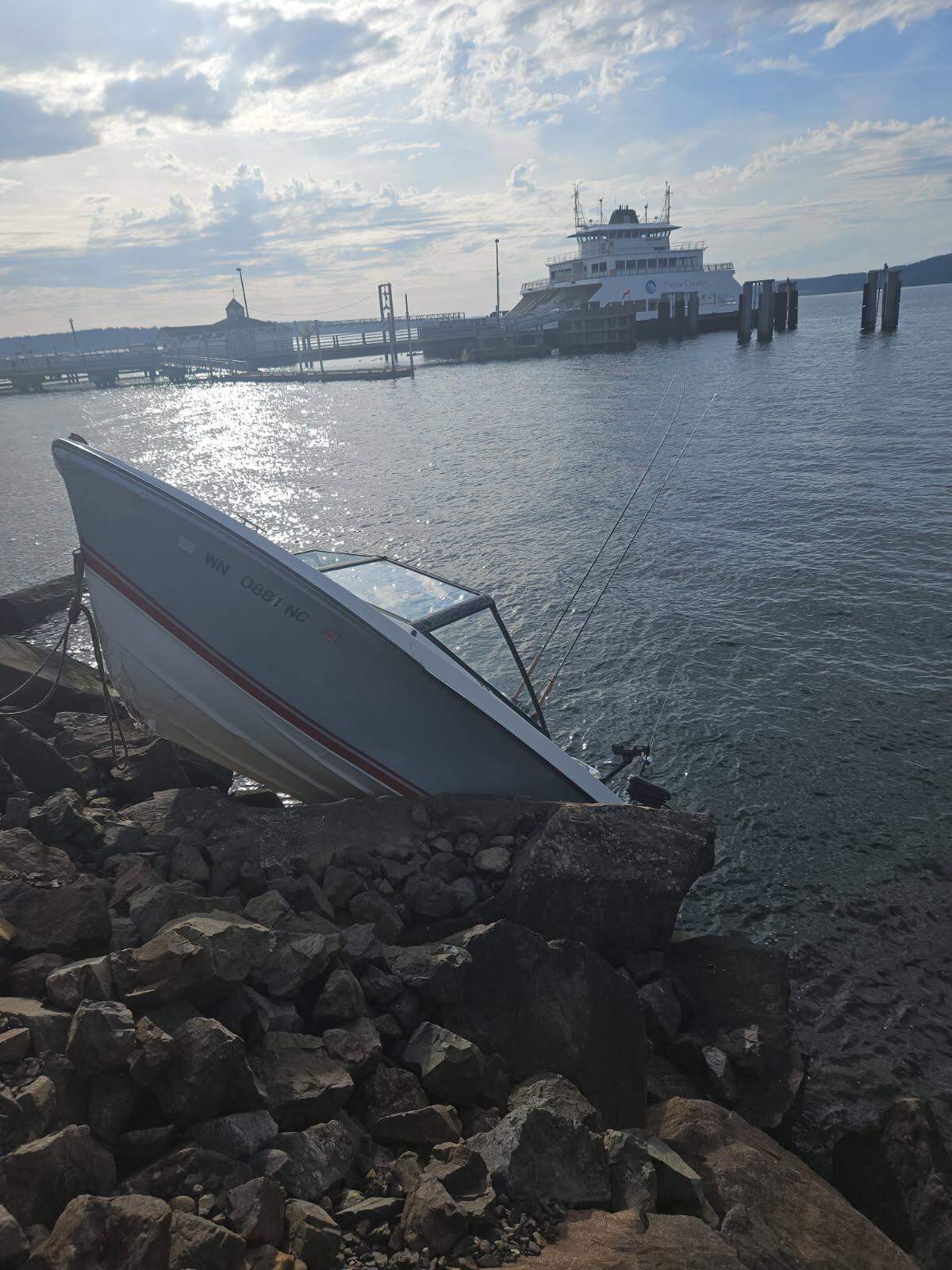 A photo shared by the Steilacoom Department of Public Safety on Facebook shows a motorboat after it crashed into a rocky embankment near the Steilacoom Ferry Dock around 5 p.m. on May 1, 2026. The driver has been arrested under suspicion of DUI.