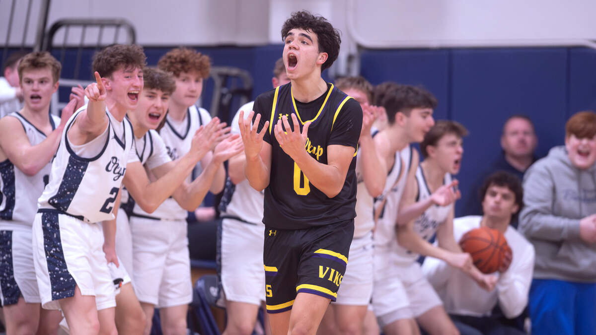 Puyallup’s Mason Sonntag reacts after the Vikings turned over the ball to the Olympia Bears during Tuesday night’s 4A SPSL boys basketball game at Olympia High School in Olympia, Washington, on Jan. 14, 2025. Olympia won the game, 62-53.
