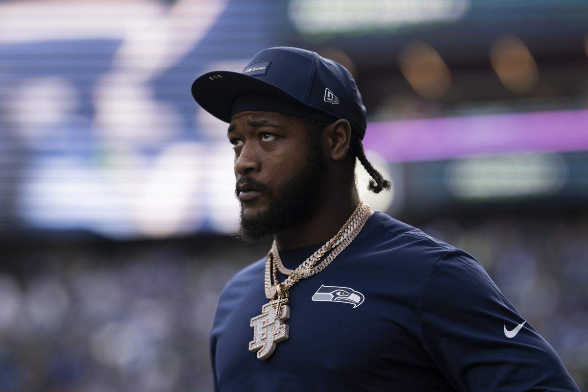 Seattle Seahawks linebacker Ernest Jones IV (13) walks out ahead of the game against the Arizona Cardinals at Lumen Field, on Sunday, Nov. 9, 2025, in Seattle.