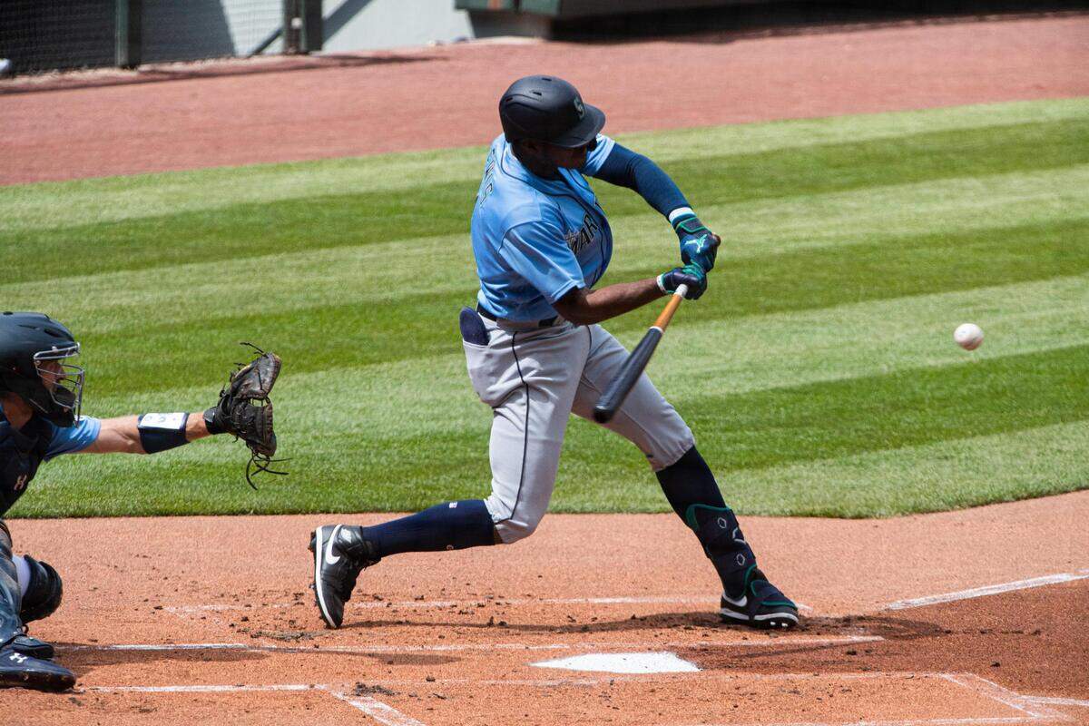 Seattle Mariners right fielder Kyle Lewis (1) hits a home run during an intrasquad practice game at T-Mobile Park in Seattle, Wash., on Sunday, July 12, 2020.