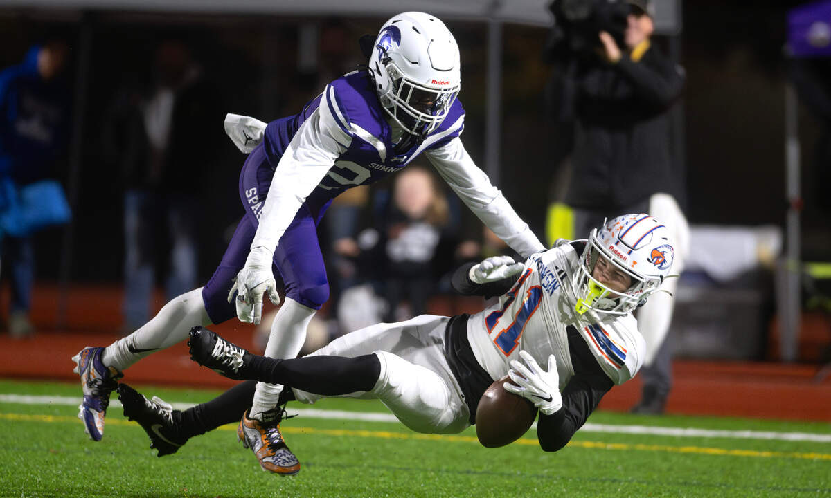 Sumner defensive back Pono Borden (left) breaks up a pass in the end zone to Graham Kapowsin wide receiver Kase Betz during Friday night’s football game at Sunset Chev Stadium in Sumner, Washington, on Nov. 1, 2024. Sumner won the game, 23-11.