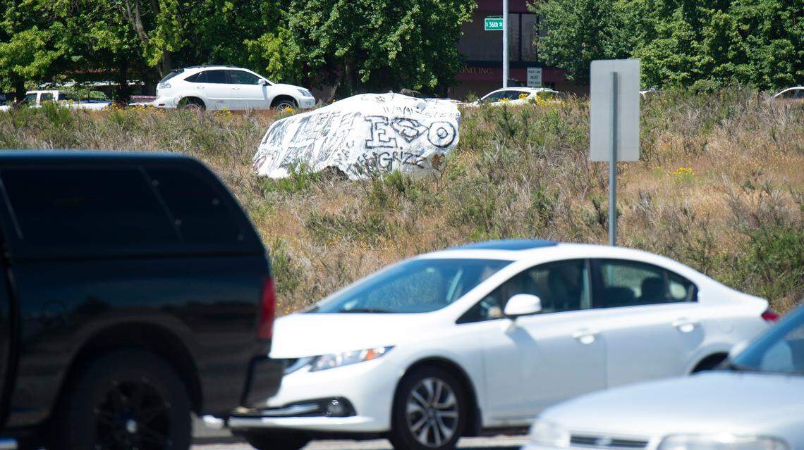 Graffiti covers a large rock alongside Interstate 5 through Tacoma on Thursday, June 25, 2020.