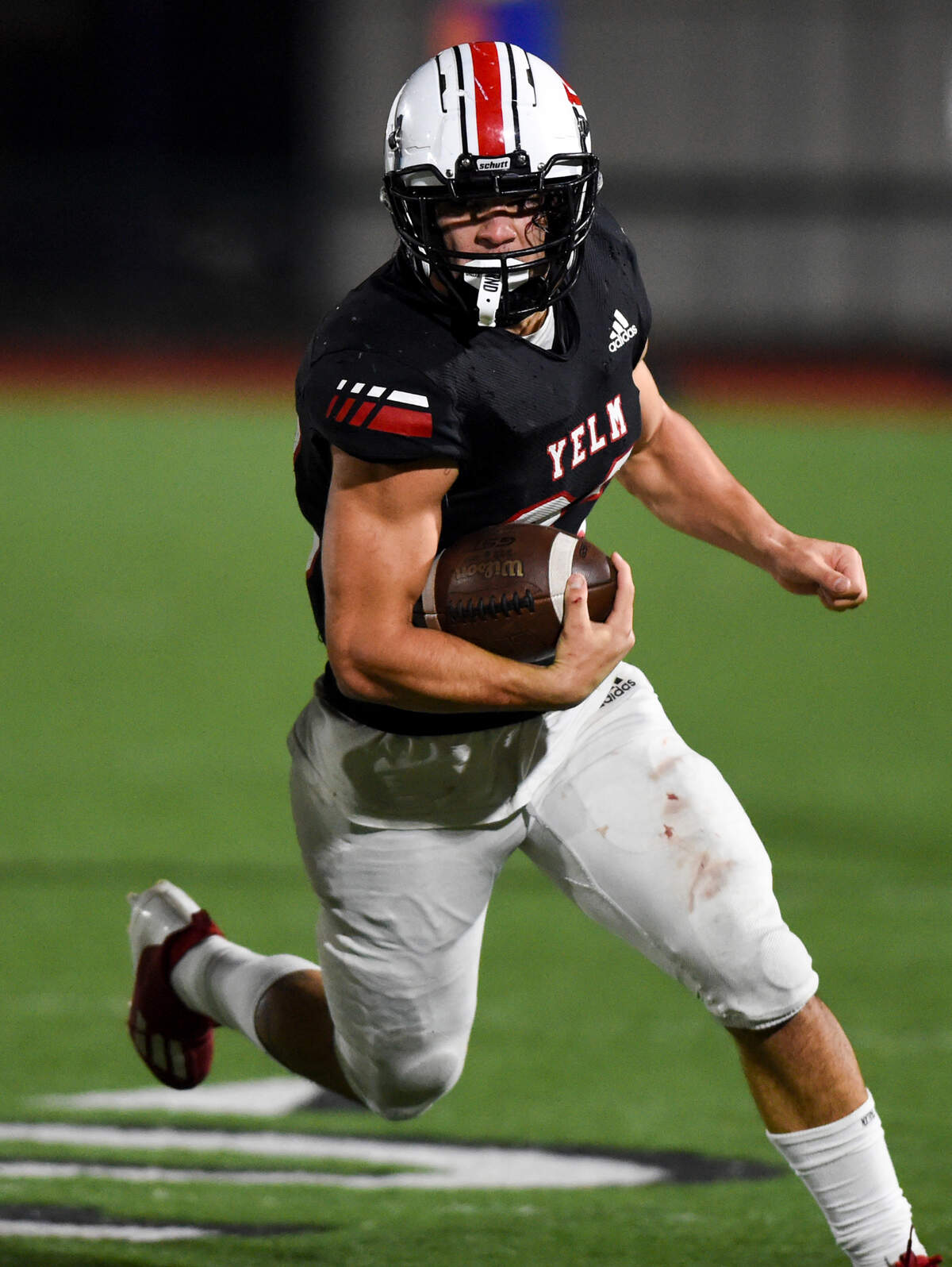 Yelm’s Brayden Platt (23) carries the ball during the first half of the 3A semifinal state game against Eastside Catholic at Art Crate Field, Saturday, Nov. 25, 2023, in Spanaway, Wash.