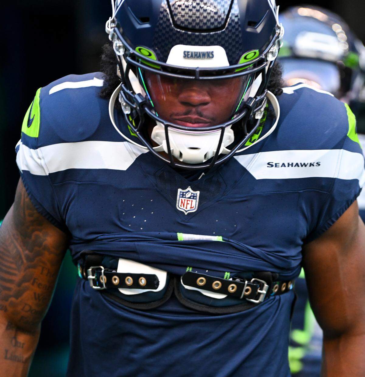 Seattle Seahawks wide receiver Dee Eskridge (1) runs out of the tunnel before of the preseason game against the Minnesota Vikings at Lumen Field, Thursday, Aug. 10, 2023, in Seattle, Wash.