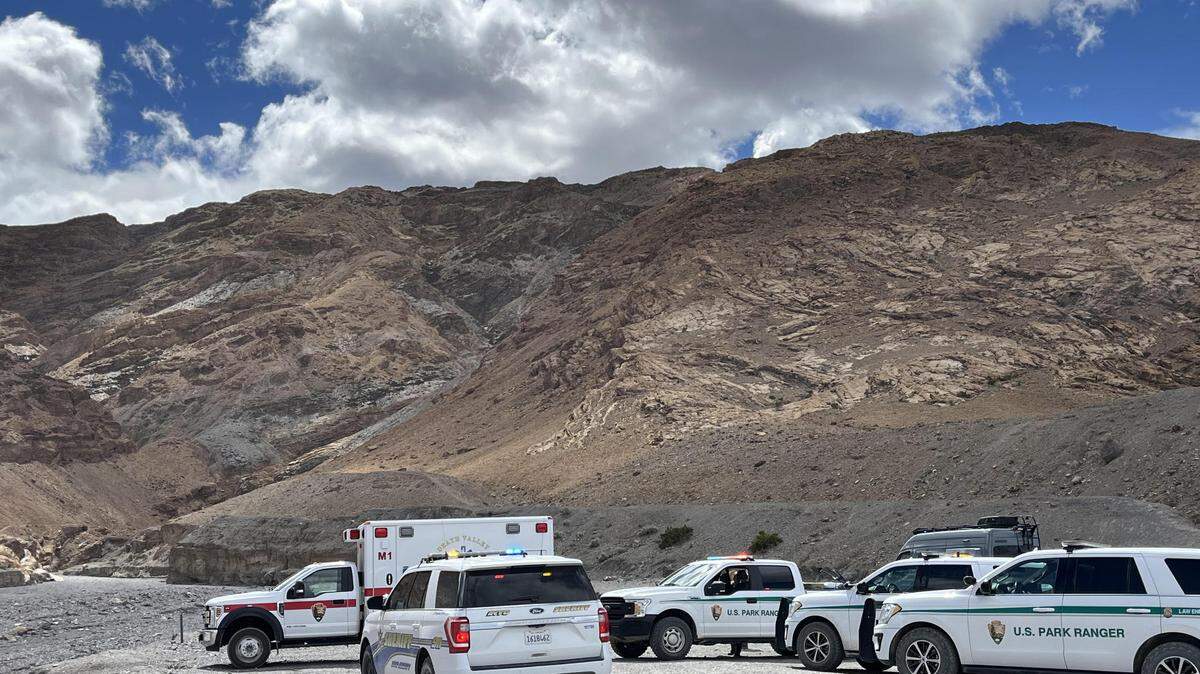 Medical and search and rescue personnel gather at the Mosaic Canyon trail head in Death Valley National Park on April 5.