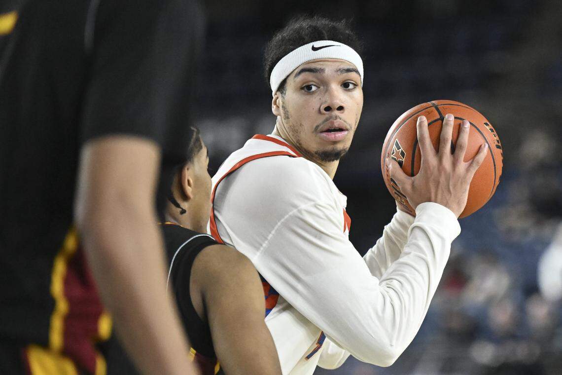 Rainier Beach wing Tyran Stokes (4) looks for an open player during the quarterfinal round of the 3A State Tournament against O’Dea at the Tacoma Dome, on Thursday, March 5, 2026, in Tacoma, Wash.