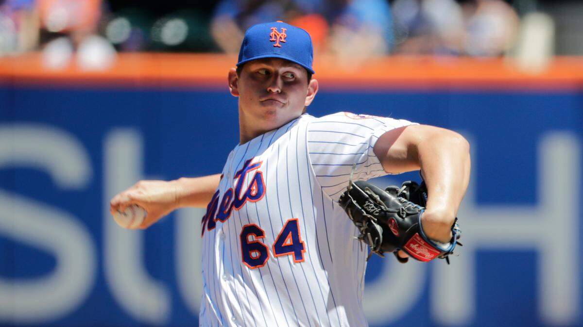 New York Mets’ Chris Flexen (64) delivers a pitch during the first inning of a baseball game against the Tampa Bay Rays, Sunday, July 8, 2018, in New York. (AP Photo/Frank Franklin II)