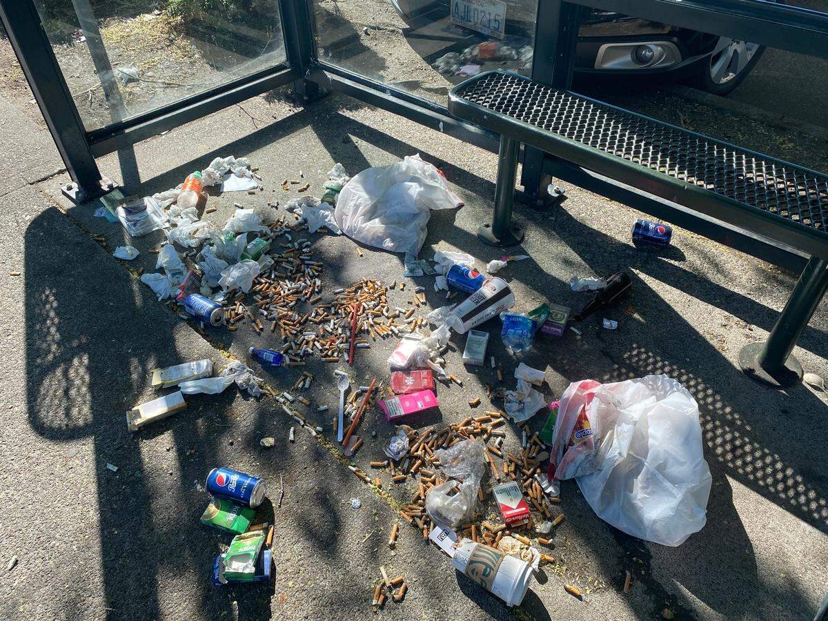 Garbage is strewn inside a Pierce Transit bus shelter on South 19th Street recently.