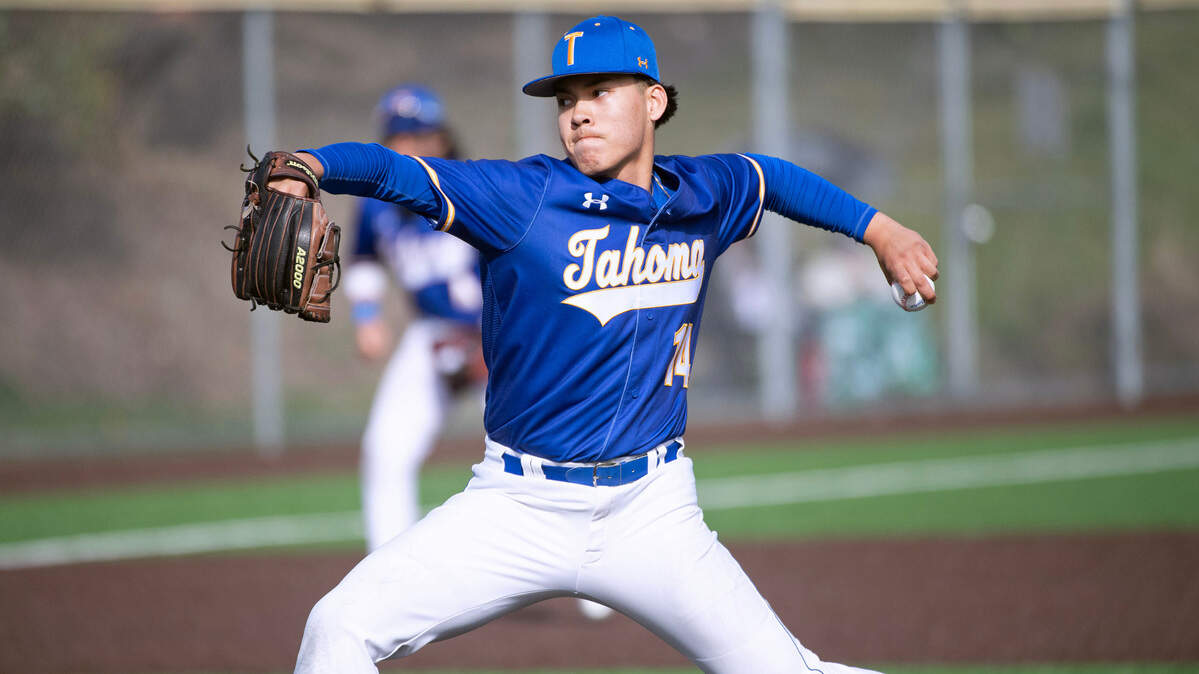 Tahoma starting pitcher Adam Jay delivers to the plate during Tuesday afternoon’s baseball game against the Federal Way Eagles at Federal Way High School in Federal Way, Washington, on Tuesday, April 18, 2023. Tahoma rallied to win the game, 4-2.