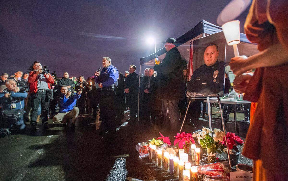 Tacoma Police Chief Don Ramsdell speaks at a vigil for fallen officer Reginald “Jake”Gutierrez held at the TPD Sector 4 Substation on December 1, 2016.