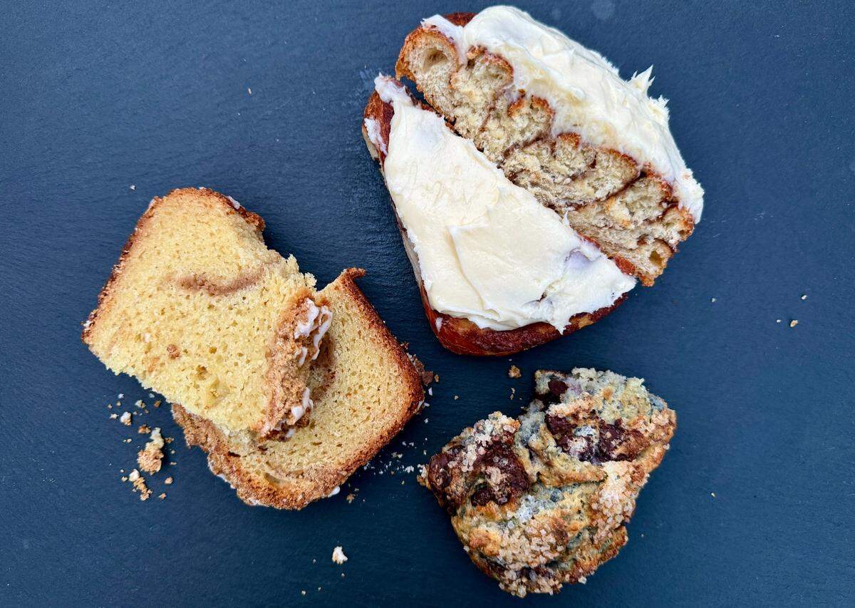 A trio of January pastries include a sourdough cinnamon roll, a blackberry-chocolate scone and a cinnamon streusel loaf.