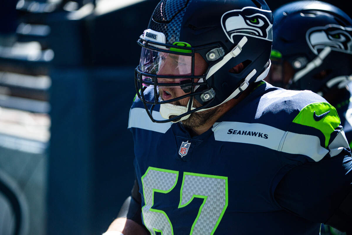 B.J. Finney takes the field before the game. The Seattle Seahawks played a mock game at CenturyLink Field in Seattle, Wash., on Wednesday, Aug. 26, 2020.