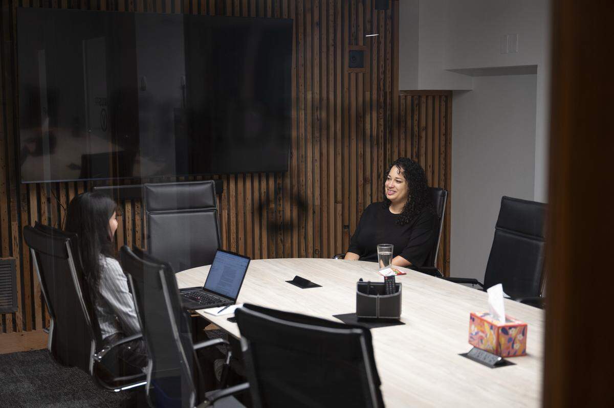 Latasha Palmer, right, Tacoma's newly elected at-large City Council member, speaks with The News Tribune on Wednesday, Dec. 3, 2025, in Tacoma, Wash.
