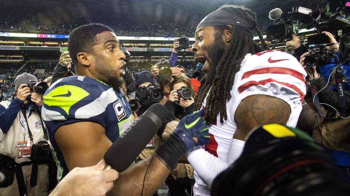 Seahawks linebacker Bobby Wagner and former teammate Richard Sherman of San Francisco playfully jaw at each other after Seattle’s decisive 43-16 victory. The Seattle Seahawks played the San Francisco 49ers  in a NFL football game at CenturyLink Field in Seattle, Wash., on Sunday, Dec. 2, 2018.
