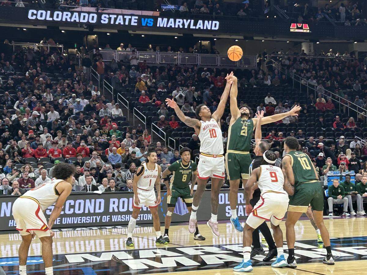 Maryland’s Julian Reese (10) and Colorado State’s Rashaan Mbemba (21) battle for the opening tip to begin their second-round NCAA tournament March Madness game at Climate Pledge Arena in Seattle Sunday, March 23, 2025.