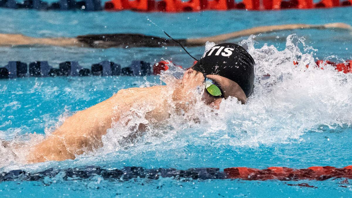 Curtis’s Patrick Keough competes in the 400-yard freestyle relay during the 4A Boys Swimming and Diving Championship prelims at the Weyerhaeuser King County Aquatic Center on Friday, Feb. 18, 2022, in Federal Way, Wash.