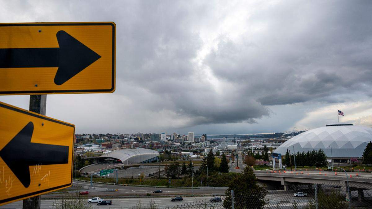 Rain clouds roll in from the southwest over downtown Tacoma, Wash., on Tuesday, April 12, 2022.