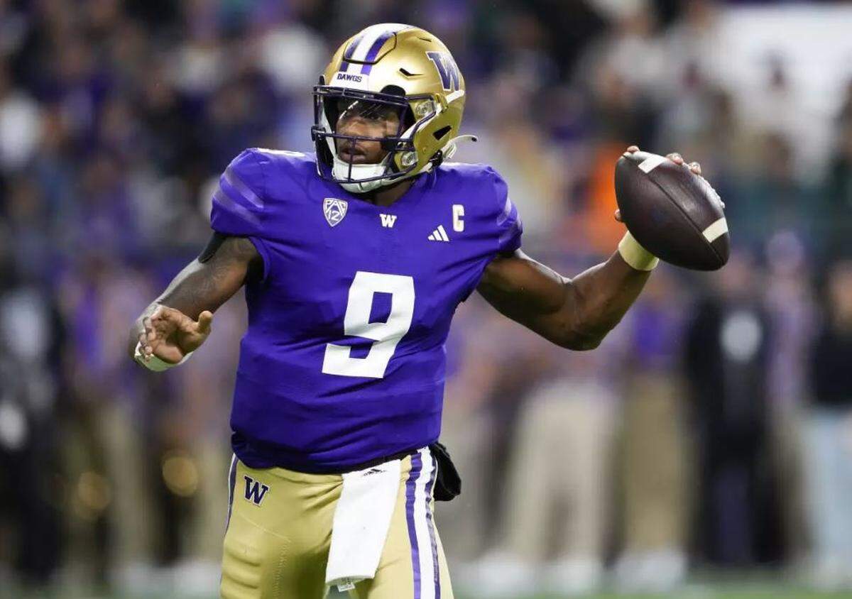 Huskies quarterback Michael Penix Jr. looks for a receiver during the first half of Washington’s NCAA football game against California on Saturday, Sept. 23, 2023, at Husky Stadium in Seattle.