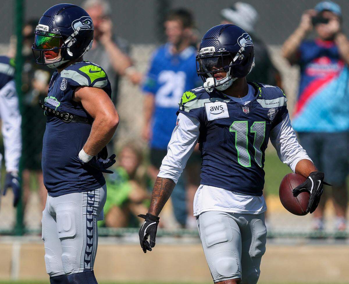 Seattle Seahawks wide receivers Cooper Kupp (10) and Jaxon Smith-Njigba (11) wait for their next drill reps during a joint practice with the Green Bay Packers on Thursday, August 21, 2025, at Clarke Hinkle Field in Ashwaubenon, Wis. Tork Mason/USA TODAY NETWORK-Wisconsin