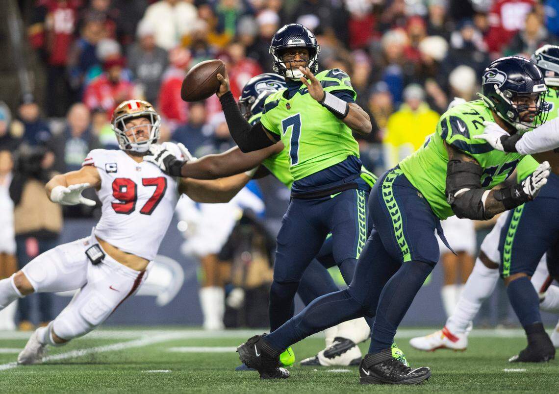 Seattle Seahawks quarterback Geno Smith (7) looks to pass the ball in the second quarter of an NFL game against the San Francisco 49ers at Lumen Field in Seattle Wash., on Dec. 15, 2022.