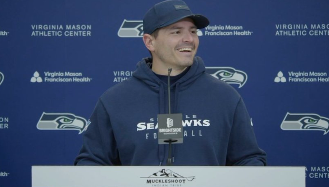 Coach Mike Macdonald jokes with reporters following Seahawks practice Friday, Jan. 23, 2026, at the Virginia Mason Athletic Center in Renton two days before Seattle hosts the Los Angeles Rams in the NFC championship game at Lumen Field.