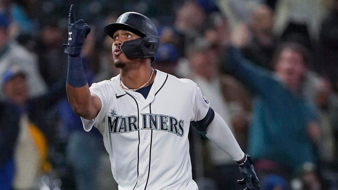 Seattle Mariners’ Julio Rodriguez reacts after hitting a two-run home run against the Oakland Athletics during the fifth inning of a baseball game Tuesday, May 24, 2022, in Seattle. (AP Photo/Ted S. Warren)