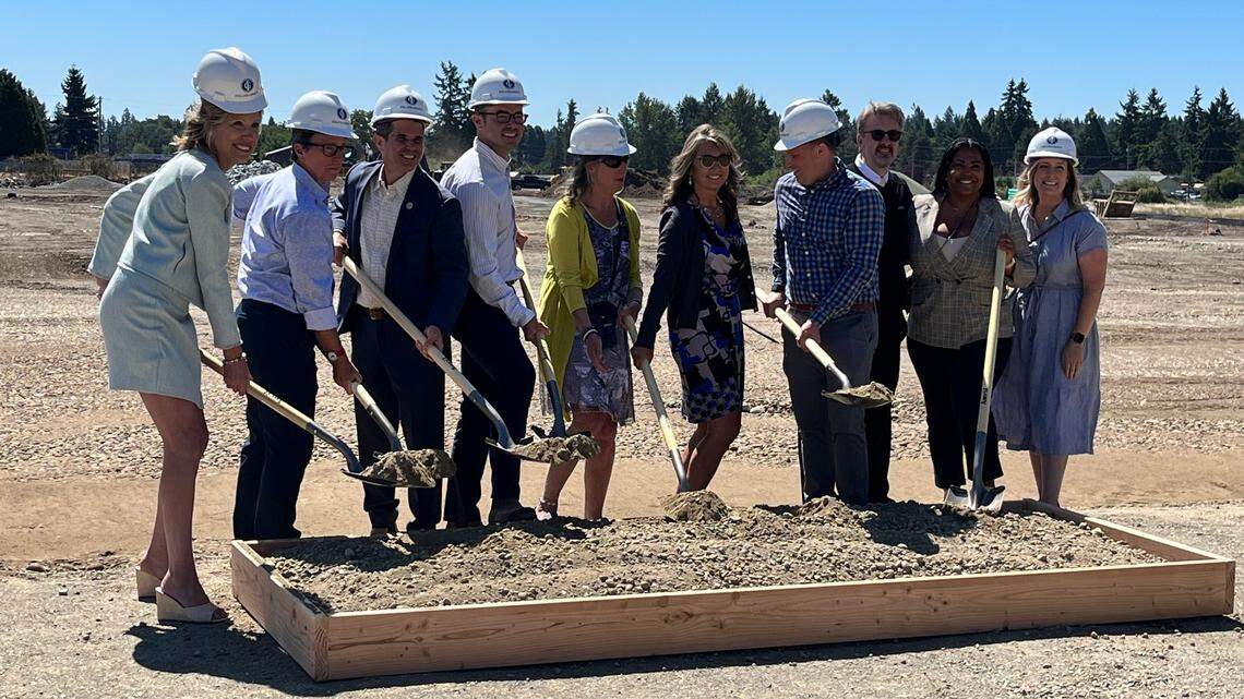 Pierce County officials, local credit unions, public and private investors, and housing advocates came together to break ground on the Copper Way project in Spanaway. From left to right: Jen Reed, vice president of public relations for Sound Credit Union; Kris Hermanns, manager, Evergreen Impact Housing Fund at Seattle Foundation; Pierce County Councilmember Ryan Mello; Joey Launceford, development associate at Inland Group; Lisa Vatske, director of multifamily housing and community facilities at Washington State Housing Finance Commission; Debbie Taglialavore, vice president of commercial and small business at BECU; Scott Schubert, executive director at Metropolitan Development Council; David Puszczewicz, director of community home ownership development at WSECU; Ziquora Banks, chief impact strategy officer at Verity Credit Union; Amanda DeShazo, executive director at Tacoma Pierce County Affordable Housing Consortium.