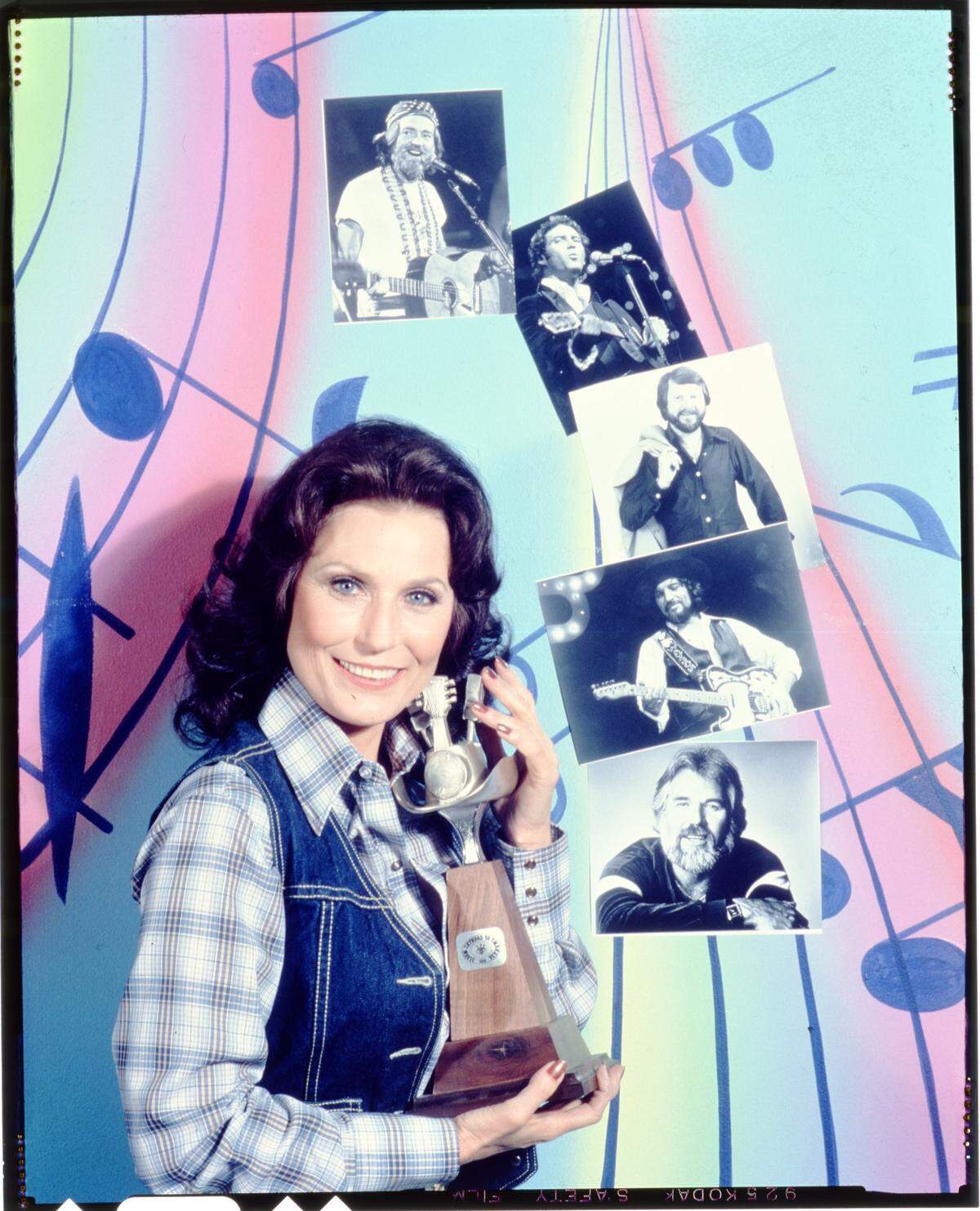 Loretta Lynn, seen here in this undated publicity photo, won countless awards, including a Grammy lifetime achievement award, in 2010. The legendary country singer-songwriter died Tuesday at age 90.