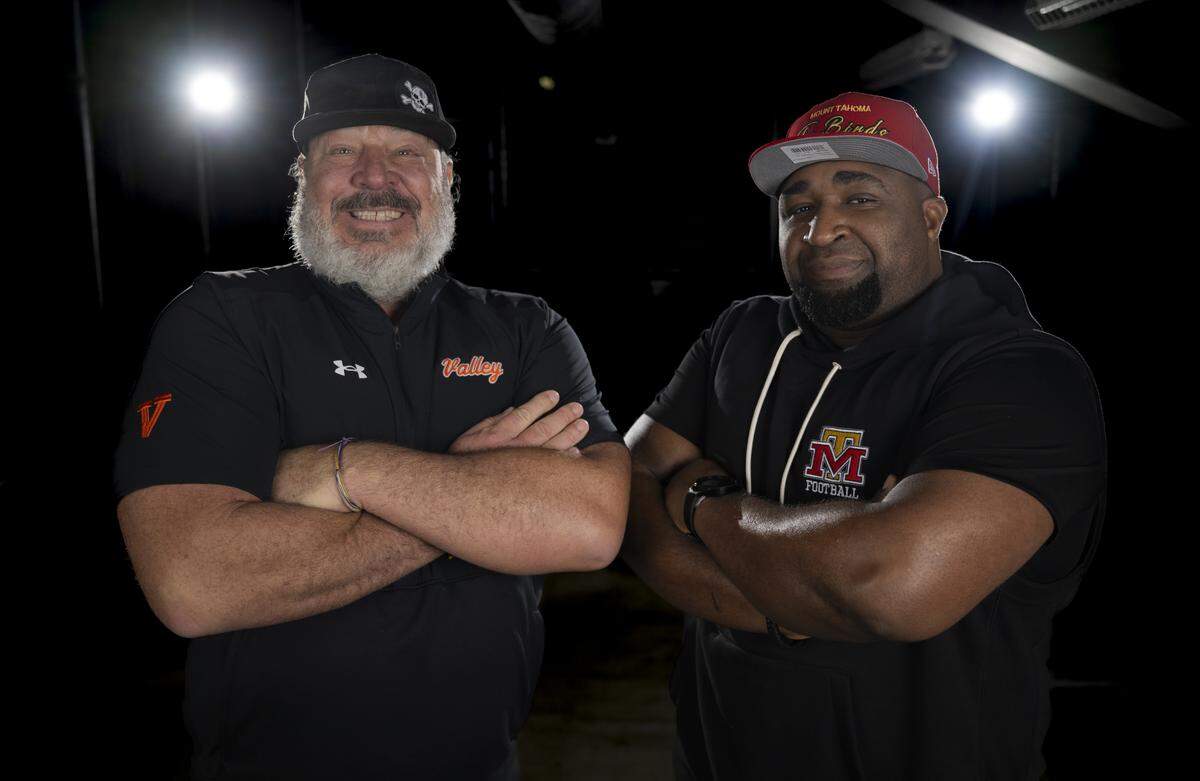 Sumner head coach Keith Ross and Mount Tahoma head coach Keith Terry pose for a portrait after being selected as coaches of the year for The News Tribune’s 2025 All-Area football team at Mount Tahoma High School, on Sunday, Dec. 7, 2025, in Tacoma, Wash.
