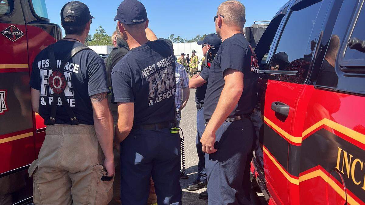 West Pierce Fire & Rescue asses an highly-pressurized chemical bin in the parking lot of the Lakewood Industrial Park. First responders continued to monitor the situation throughout Wednesday afternoon and early evening.