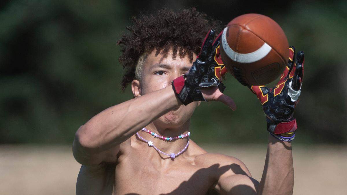 Spanaway Lake wide receiver Jasiah Wagoner pulls in a catch during football practice at Spanaway Lake High School in Spanaway, Washington, on Thursday, Aug. 19, 2021.
